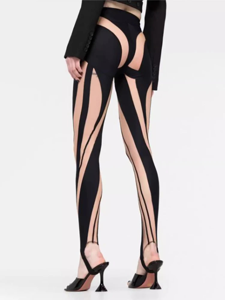 Woman wearing Color Block Mesh Splicing Leggings in an urban setting