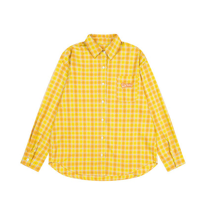 Woman wearing Embroidered Letter Plaid Shirt in a casual outdoor setting