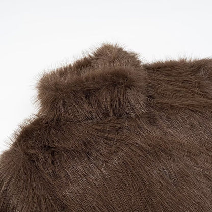 Woman wearing High Neck Long Sleeve Loose Fit Faux Fur Coat in a winter setting