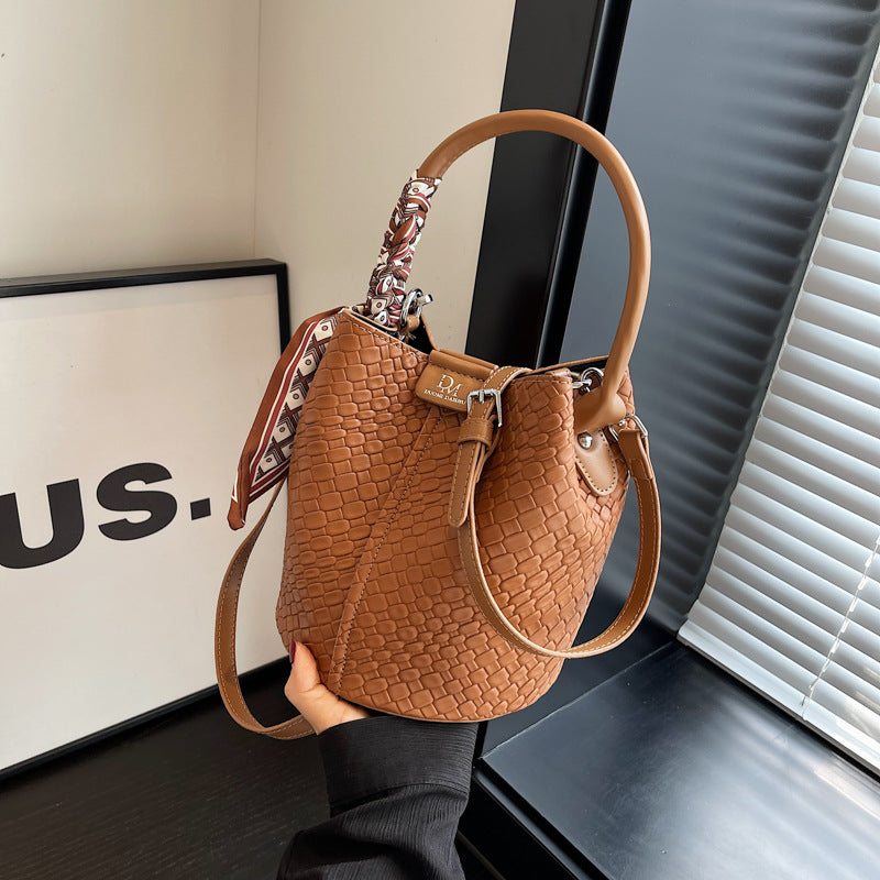 Women's Urban Minimalist PU Woven Magnetic Clasp Shoulder Bucket Bag – Model View | TajStylo