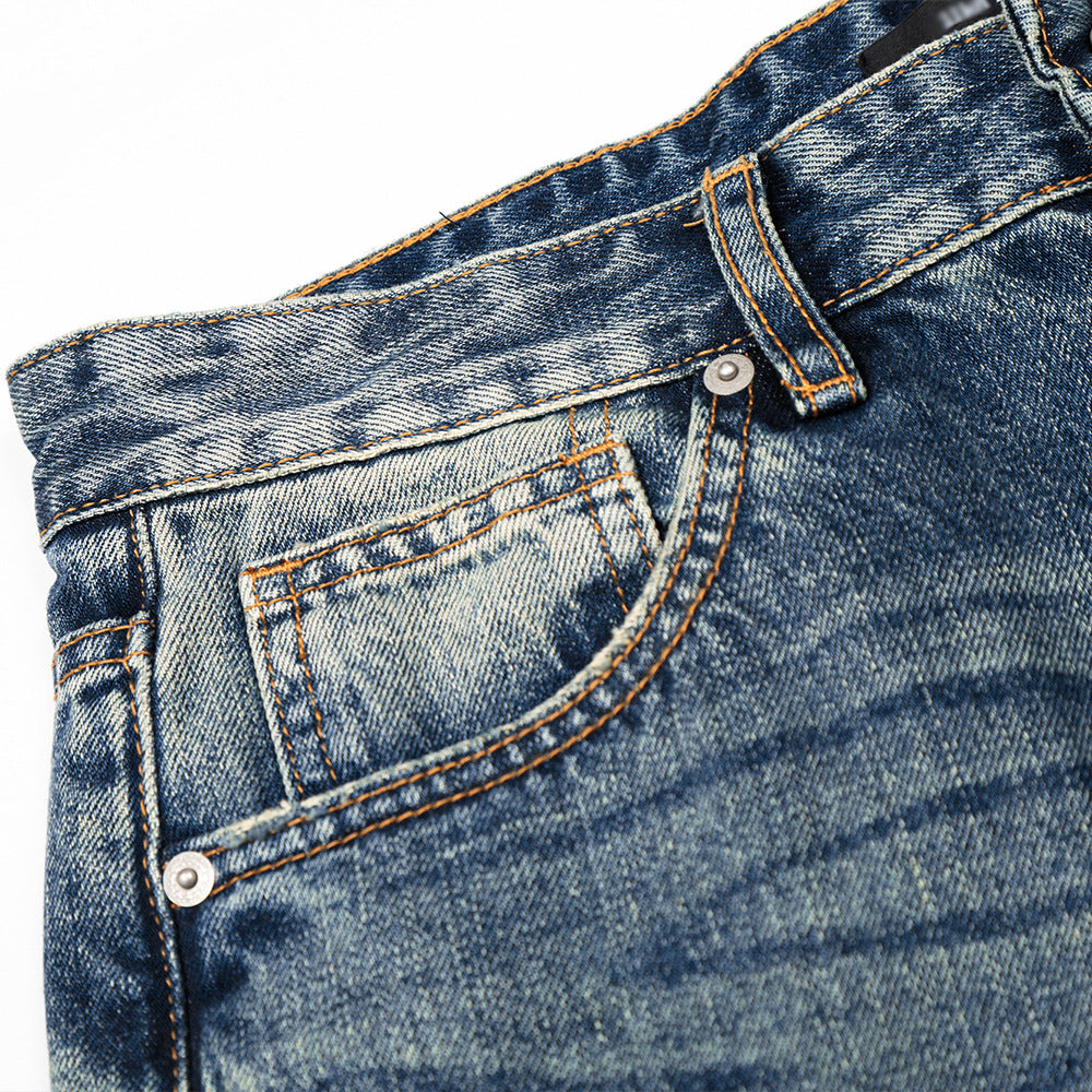 Woman wearing Washed Blue Straight Leg Denim Pants in a casual setting