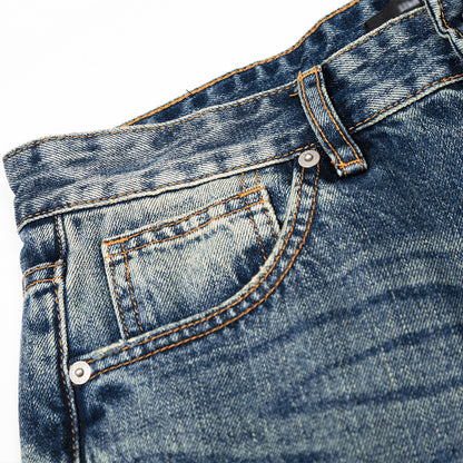 Woman wearing Washed Blue Straight Leg Denim Pants in a casual setting