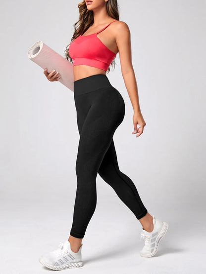 Woman wearing High Waist Active Leggings in a workout setting