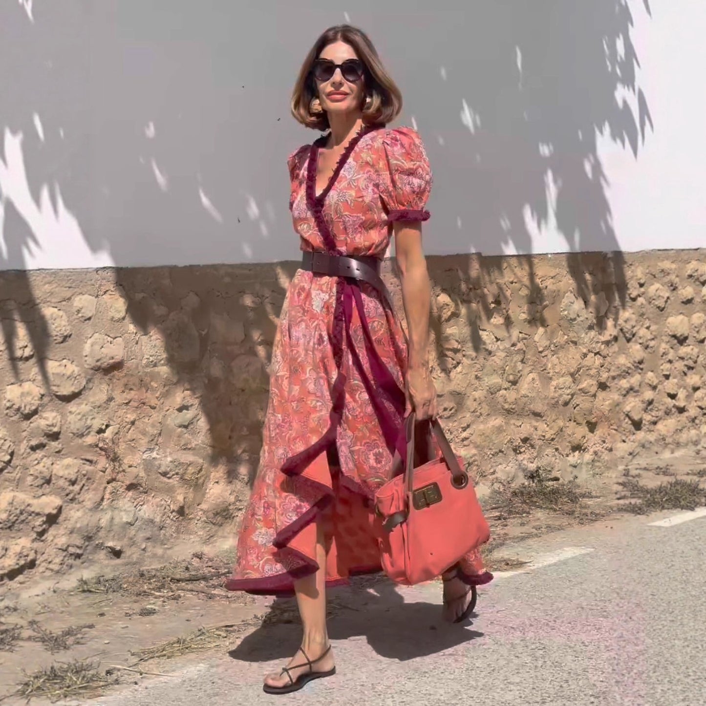 Woman wearing Bohemian Elegant Midi Dress in a garden setting