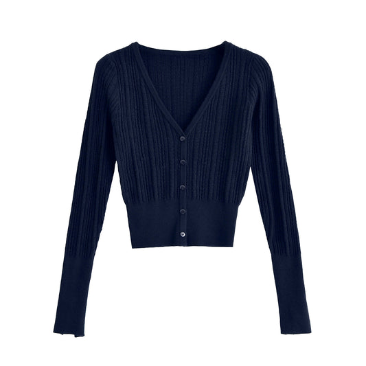 Woman wearing V-Neck Slim Fit Long Sleeve Top in a stylish office setting