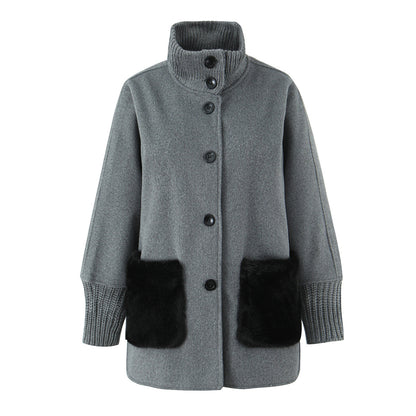 Woman wearing Stand Collar Knitted Patchwork Jacket in a casual setting