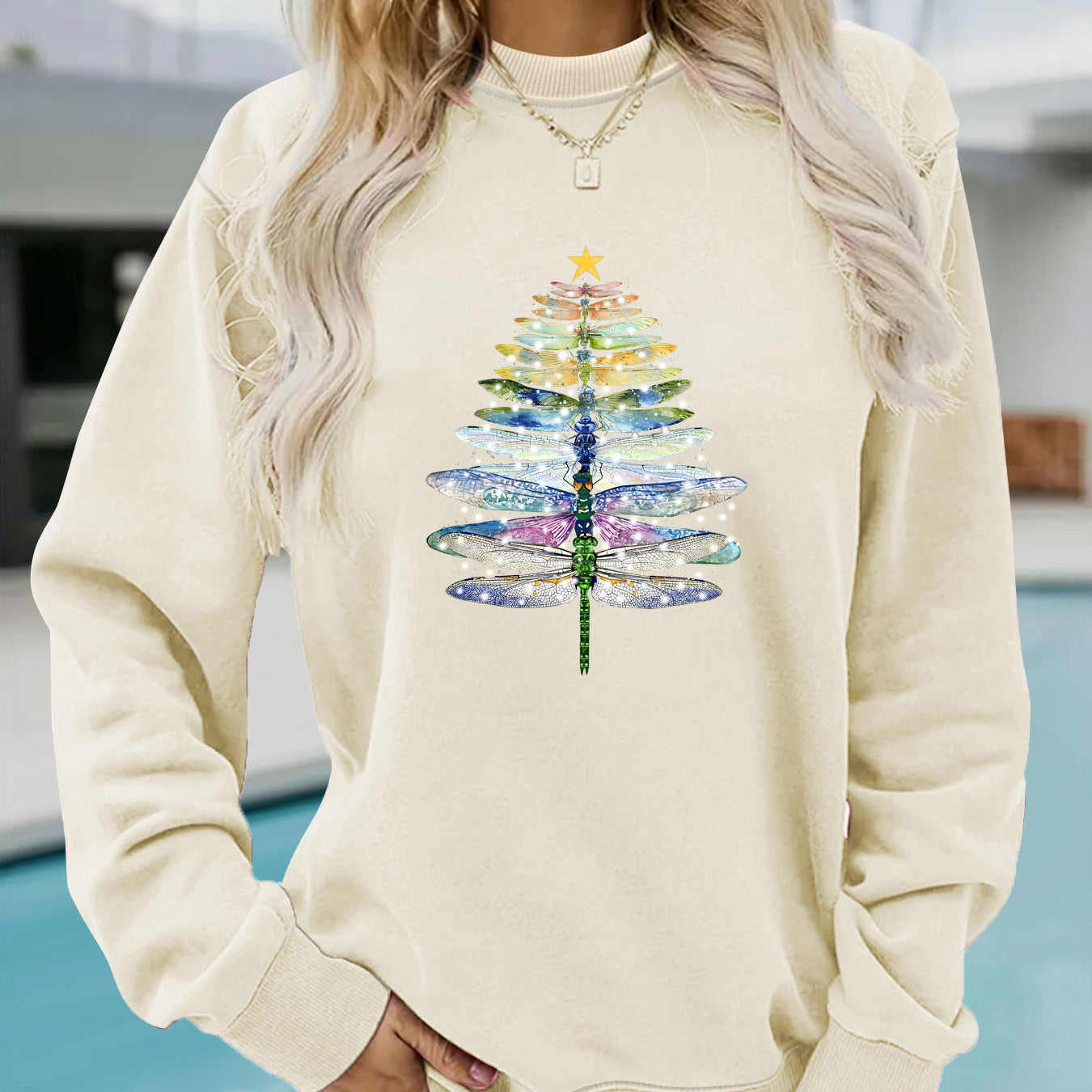 Woman wearing Dragonfly Printed Hoodie in a casual setting