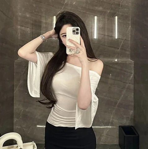 Woman wearing Batwing Sleeve Top in a casual setting