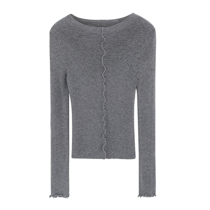 Woman wearing Lace Trim Round Neck Long Sleeve Knit Top in a stylish setting