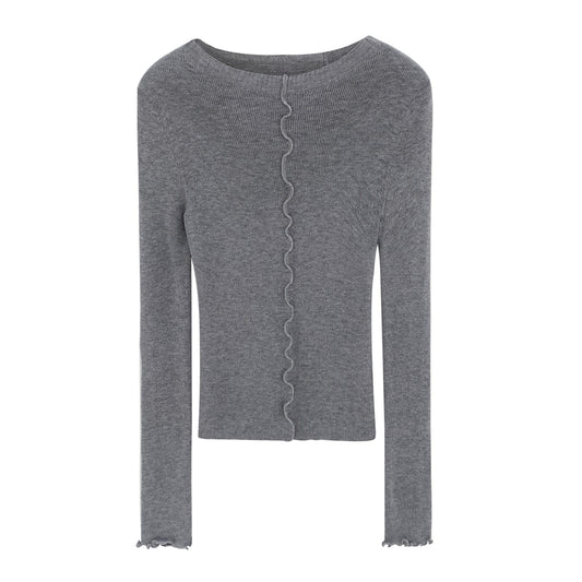Woman wearing Lace Trim Round Neck Long Sleeve Knit Top in a stylish setting