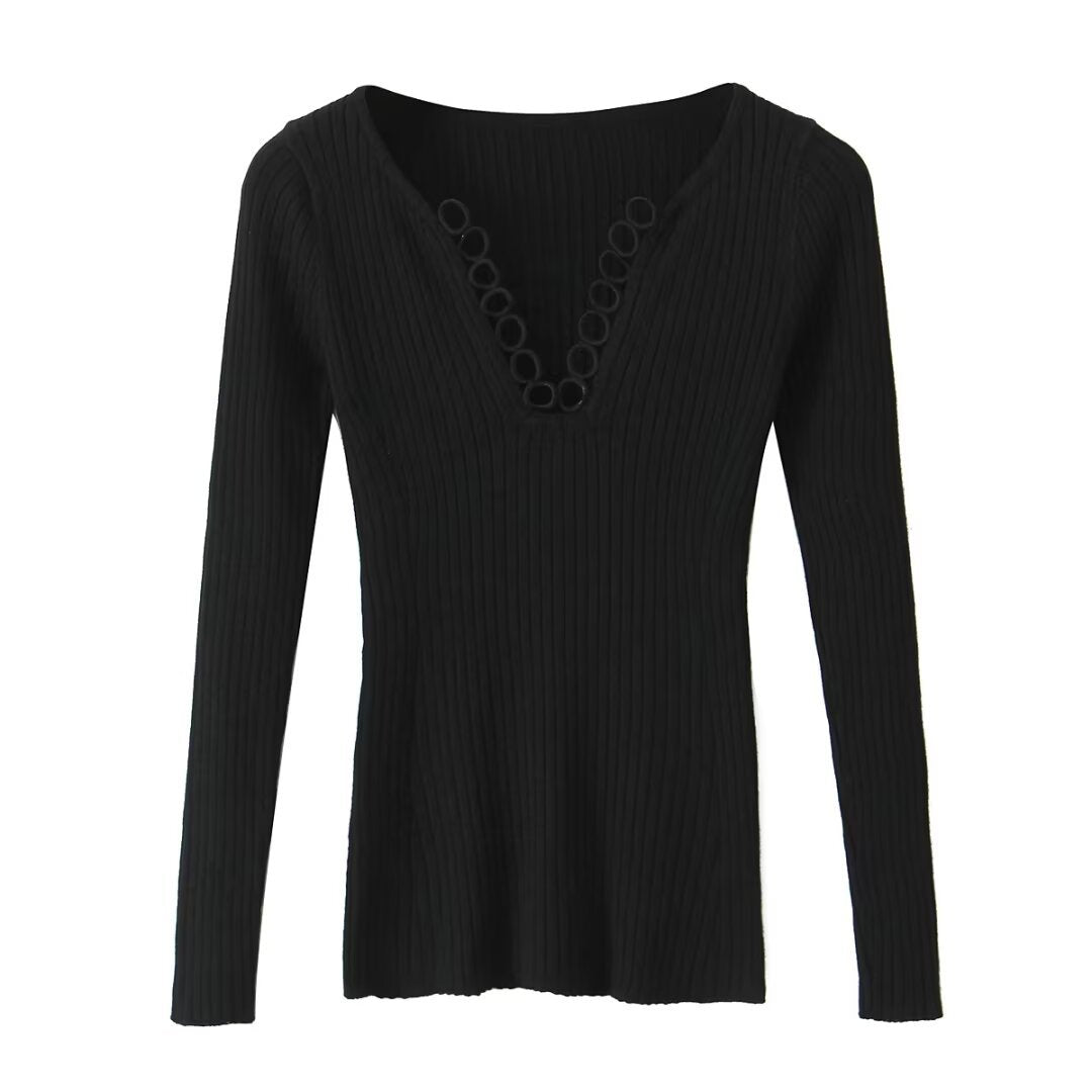 Woman wearing V-Neck Hollowed Out Slim Fit Top in a stylish setting