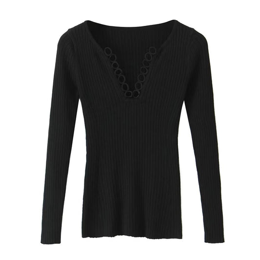 Woman wearing V-Neck Hollowed Out Slim Fit Top in a stylish setting
