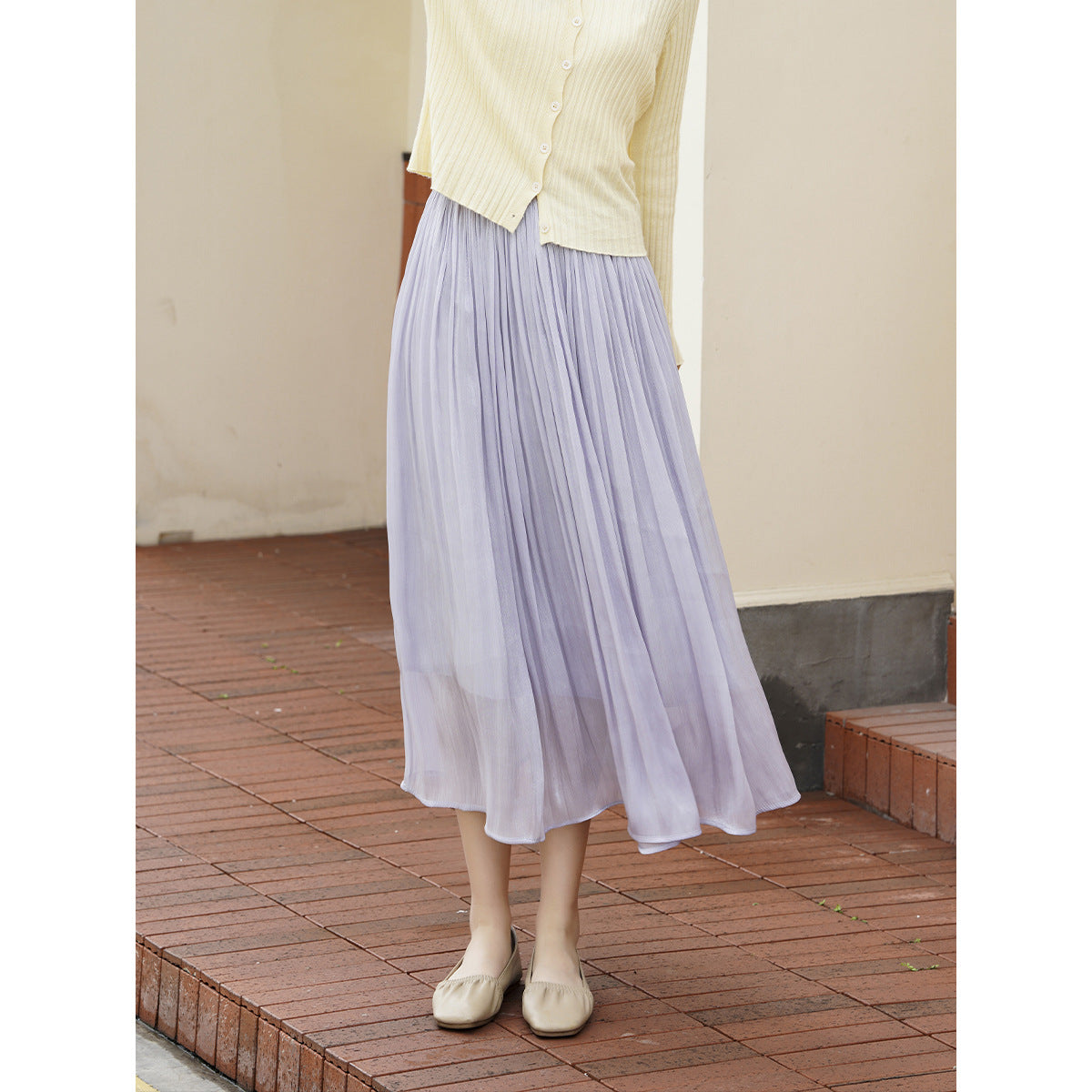 Woman wearing A-Line Skirt in a stylish urban setting
