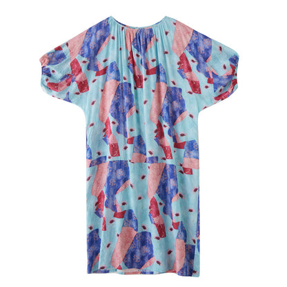 Woman wearing Multi-Color Printed Loose Dress in a sunny outdoor setting