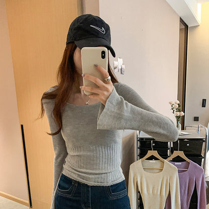 Woman wearing Square Neck Flared Long Sleeve Knit Top in a stylish setting