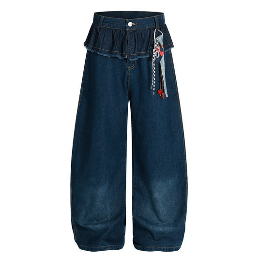 Woman wearing Machete Mid Rise Loose Fit Jeans in a casual street setting