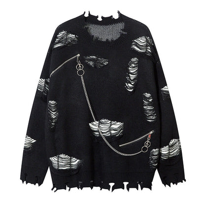 Woman wearing Ripped Chain Splicing Loose Knit Sweater in an urban setting