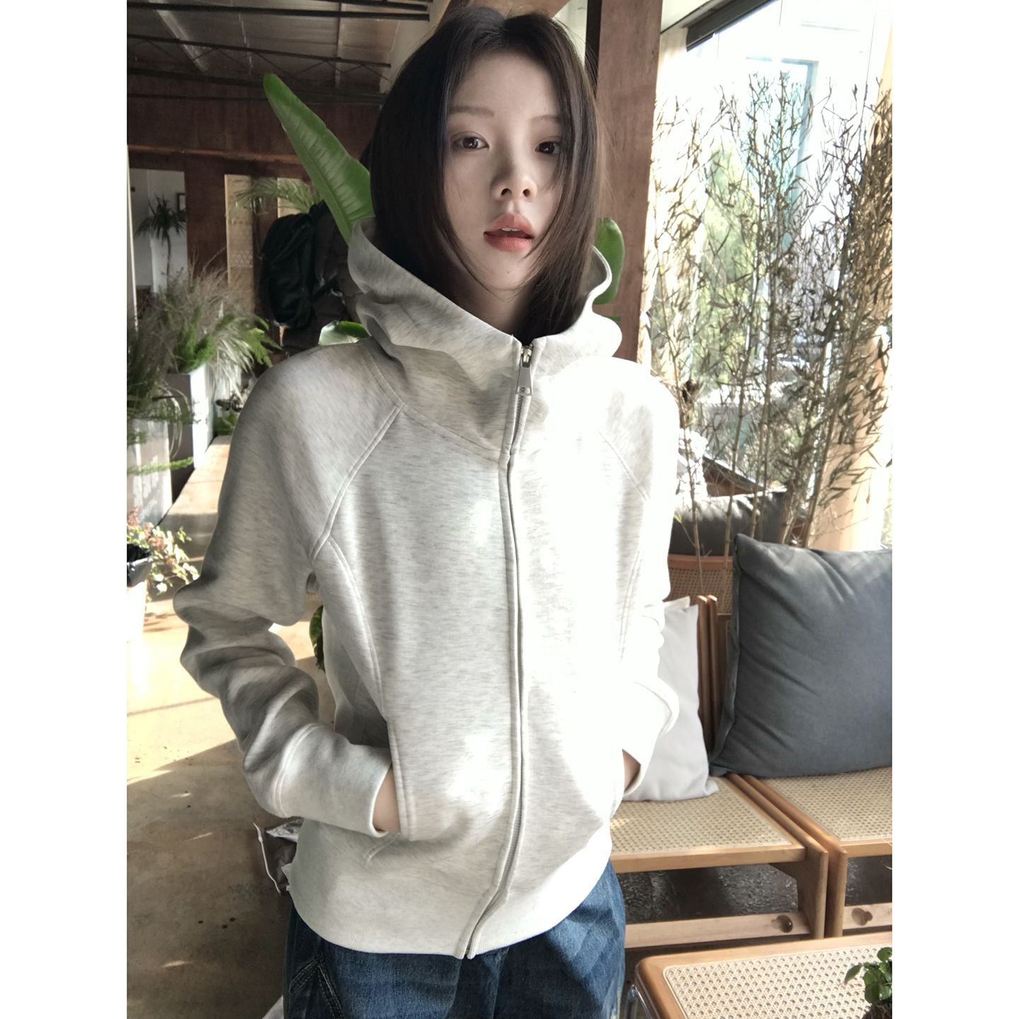 Woman wearing Hooded Sweatshirt for Women in a cozy outdoor setting