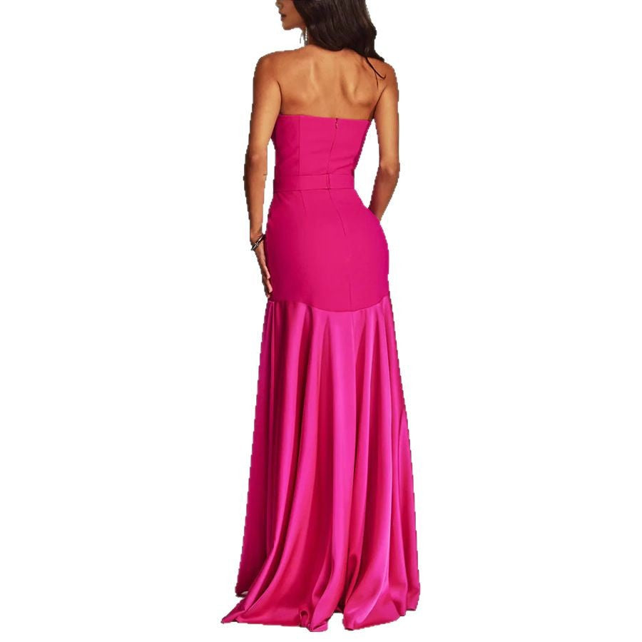 Woman wearing sleeveless long dress in a sunny outdoor setting