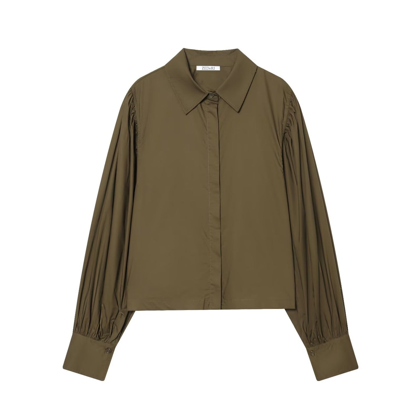 Woman wearing Bubble Sleeve Poplin Shirt in a casual setting