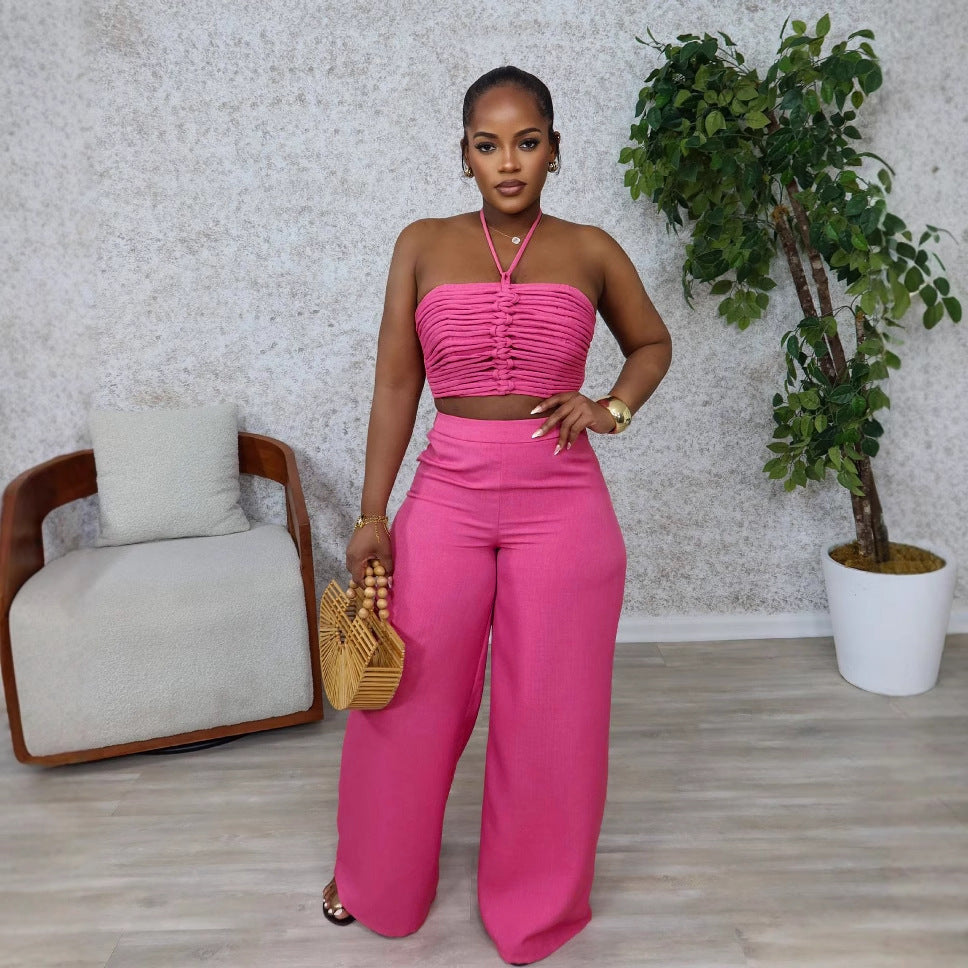 Woman wearing Drawstring Tie-Up Top and High Waist Loose Long Pants Set in a city setting