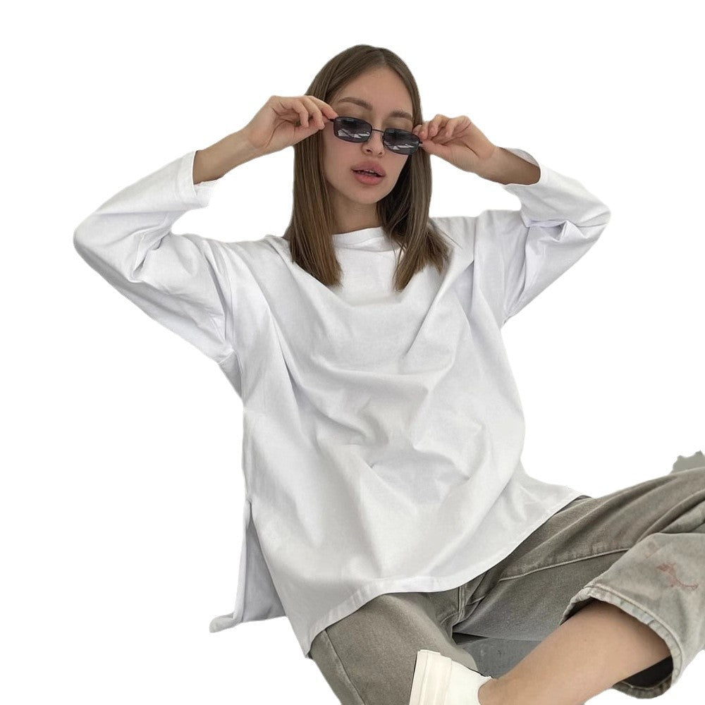 Woman wearing Loose Fit Long Sleeve Slit T-Shirt in a casual setting