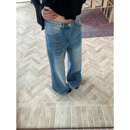 Woman wearing fleece lined wide leg jeans in a casual street setting