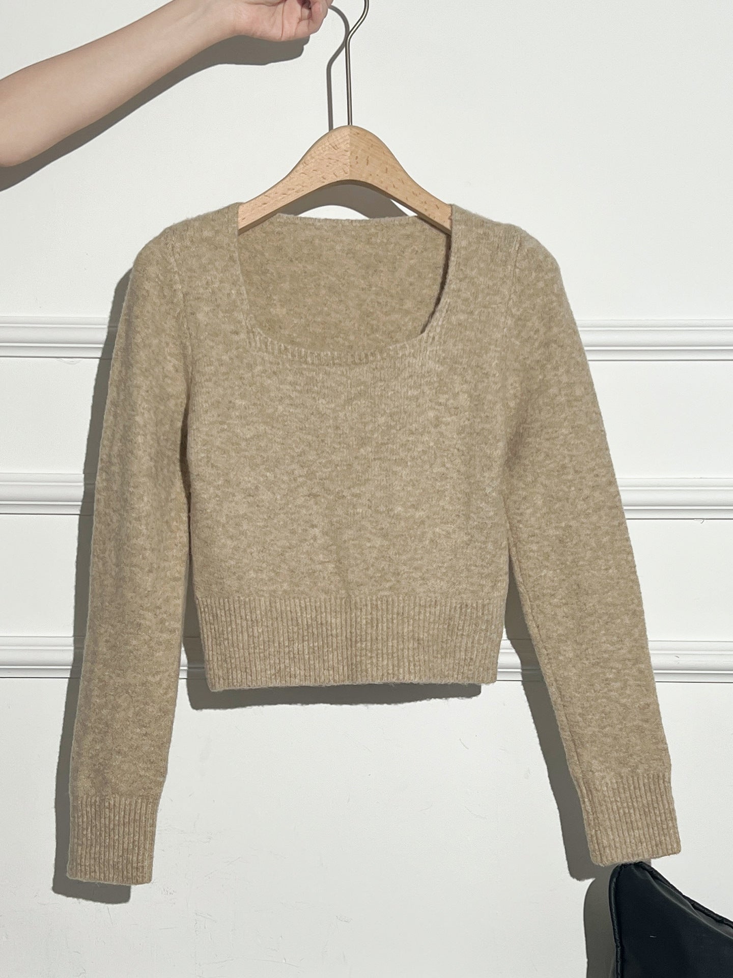 Woman wearing Short Knit Sweater in a casual setting