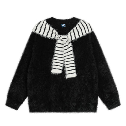 Woman wearing Oversized Loose Fit Poncho Knit Sweater in a cozy indoor setting