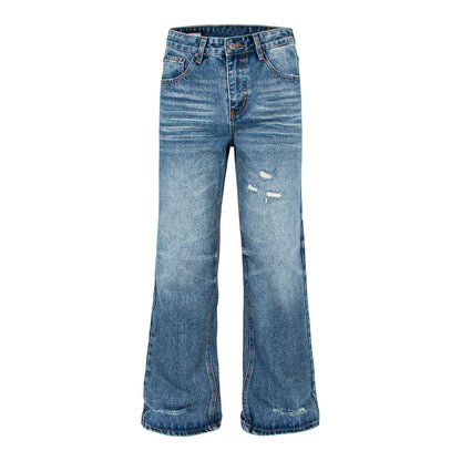 Woman wearing Distressed Flared Denim Jeans in a city setting