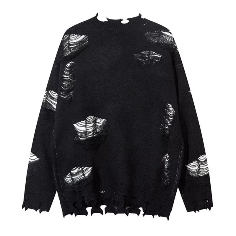 Woman wearing Ripped Chain Splicing Loose Knit Sweater in an urban setting