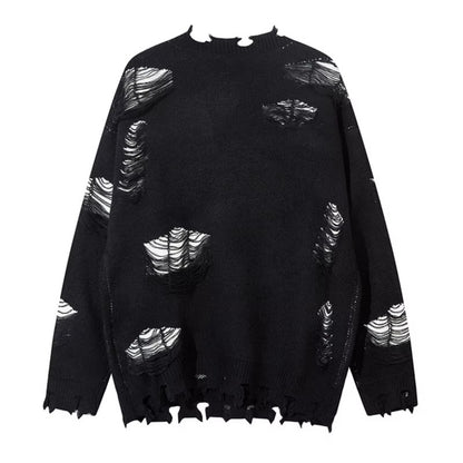 Woman wearing Ripped Chain Splicing Loose Knit Sweater in an urban setting