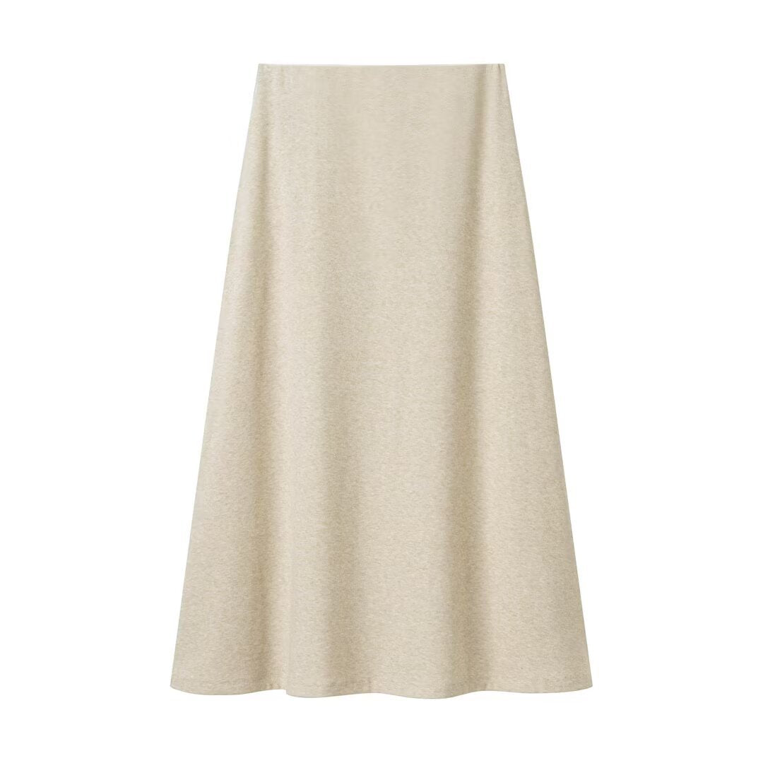 Woman wearing Knot Detail Top and Flute Midi Skirt Set in a sunny outdoor setting