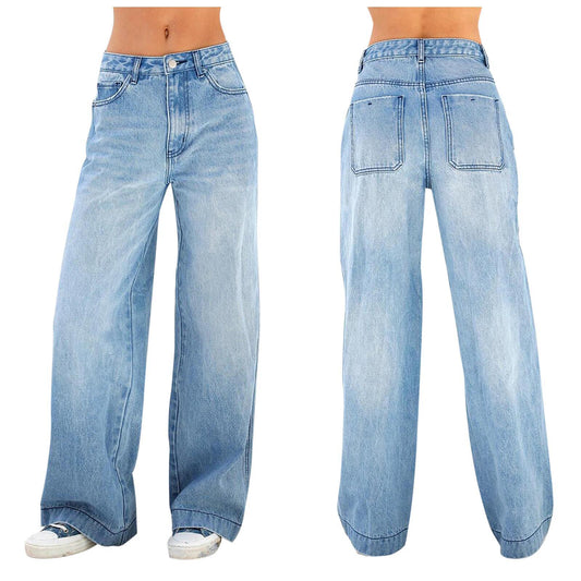 Woman wearing loose denim pants in a casual outdoor setting