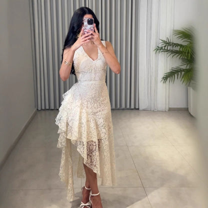 Woman wearing Asymmetric Jacquard Dress in an elegant setting