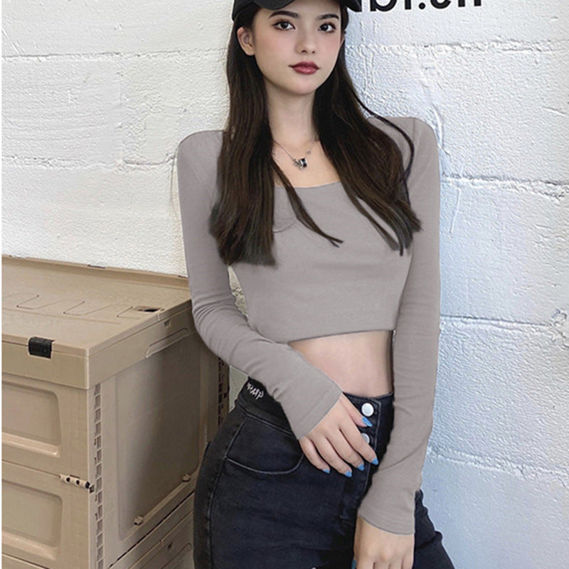Woman wearing Slim Fit Round Neck Long Sleeve Basic T-Shirt in a casual setting