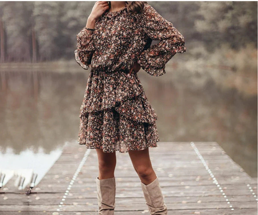 Woman wearing Floral Print Ruffle Sleeve Midi Dress in a garden setting