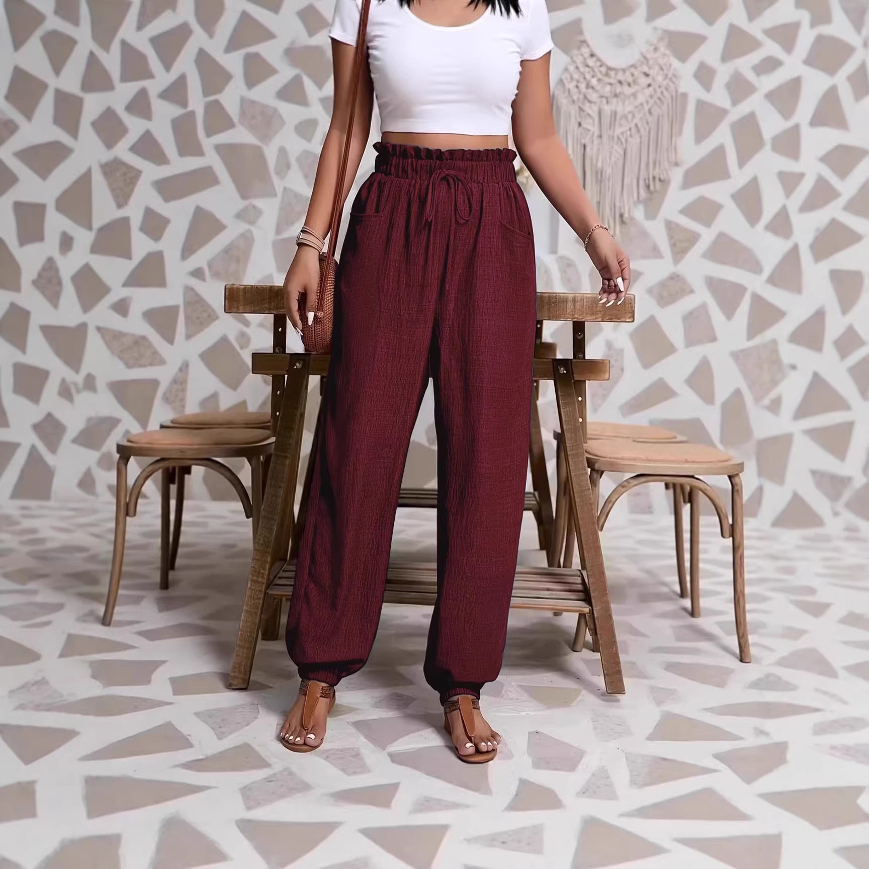 Woman wearing Elastic Solid Color Pants in a casual setting
