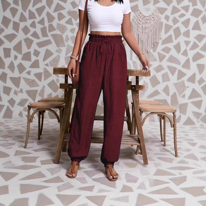 Woman wearing Elastic Solid Color Pants in a casual setting