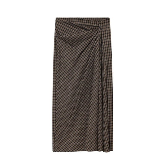 Woman wearing Elegant Plaid Midi Skirt in a stylish outdoor setting