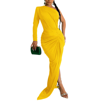 Woman wearing Asymmetric Neck Single Long Sleeve Maxi Dress in a stylish setting
