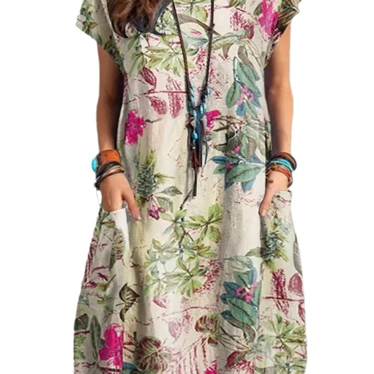 Woman wearing Floral A-Line Cap Sleeve Dress in a garden setting
