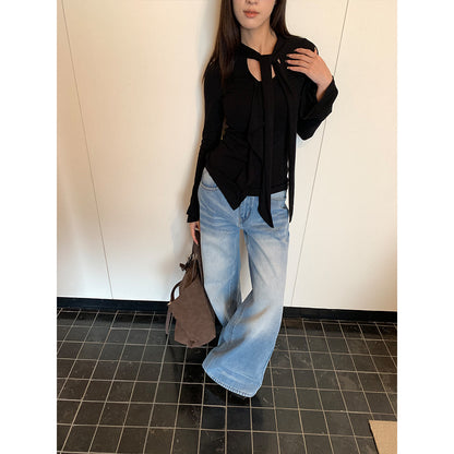 Woman wearing fleece lined wide leg jeans in a casual street setting