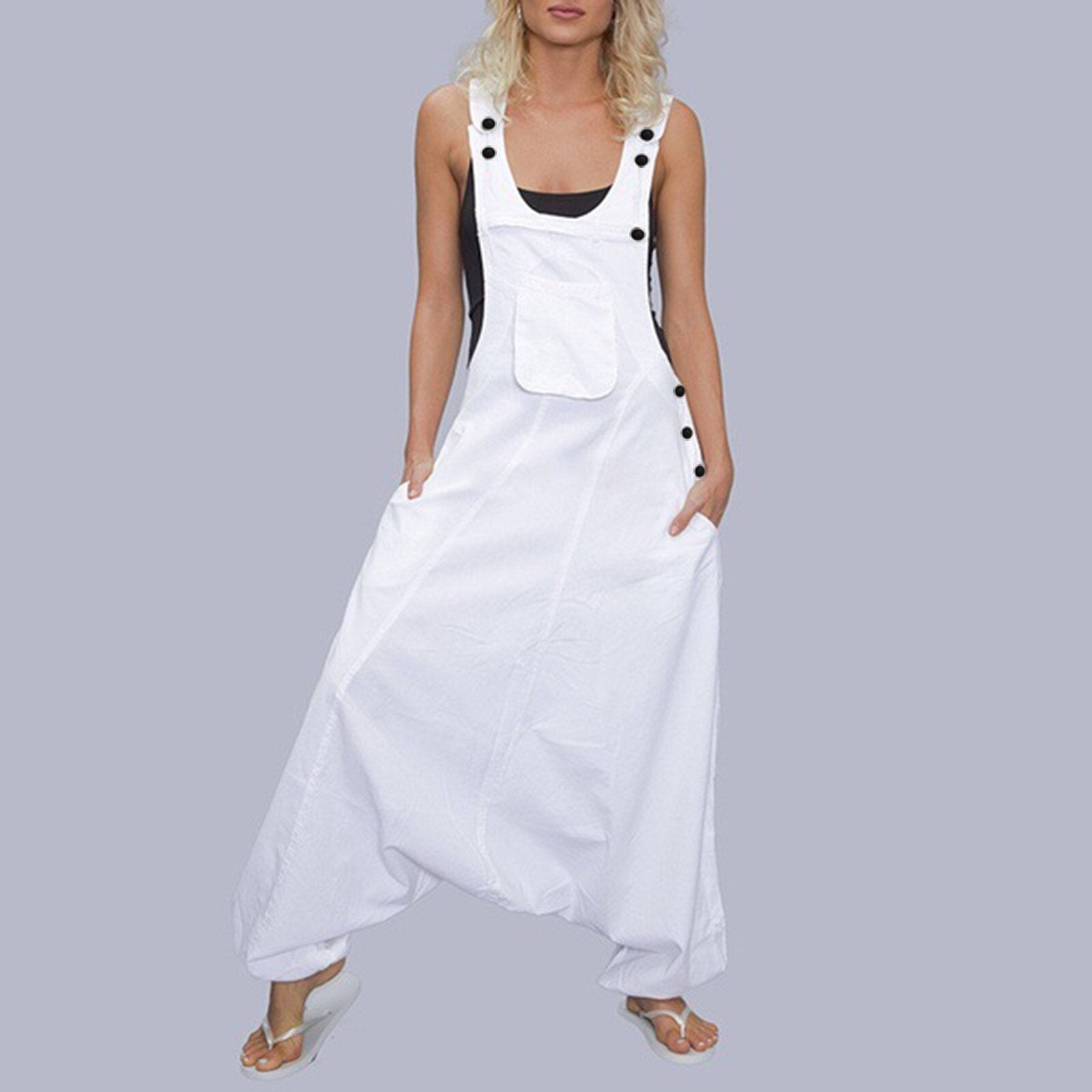 Woman wearing Wide Leg Harem Jumpsuit with Pockets in a sunny outdoor setting