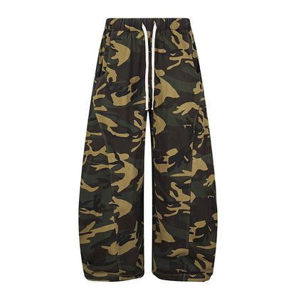 Woman wearing camouflage straight leg casual pants in an urban setting