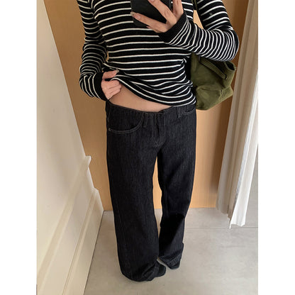 Woman wearing Low Waist Flared Denim Jeans in a casual setting