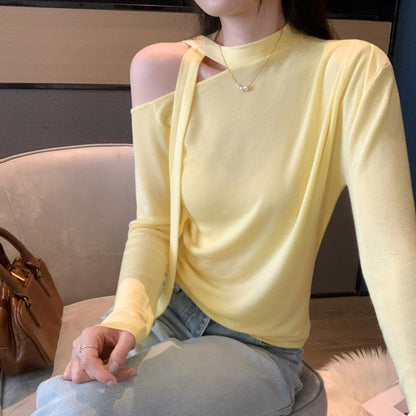 Woman wearing Lace Up Butterfly Long Sleeve Top in a casual setting