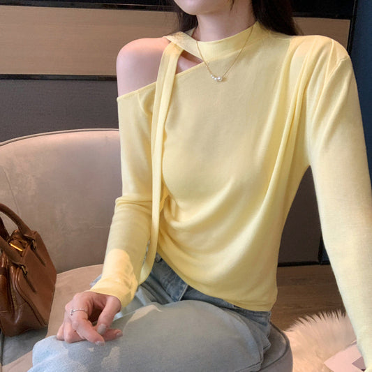 Woman wearing Lace Up Butterfly Long Sleeve Top in a casual setting