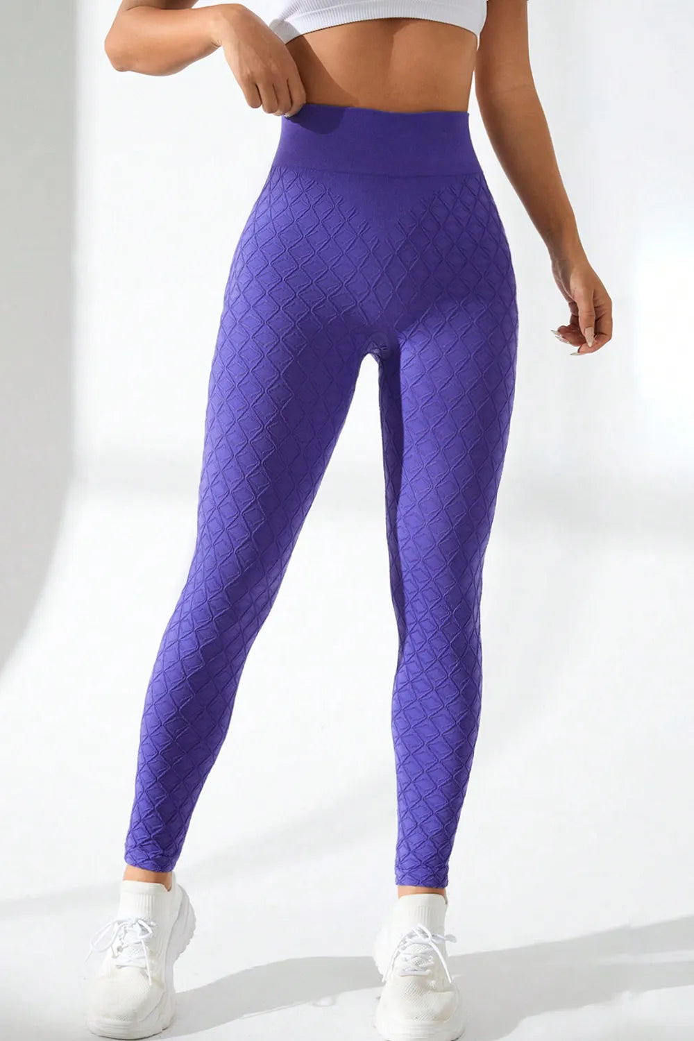 Woman wearing High Waist Active Leggings in a workout setting