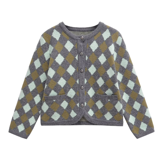 Woman wearing Diamond Jacquard Sweater in a casual setting